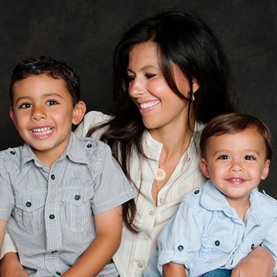 Downers Grove and Hinsdale pediatric dentist Doctor Mira Albert laughing with two young boys